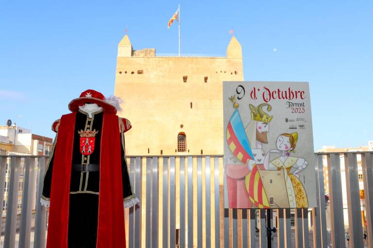 Cartel del 9 de octubre con el castillo de Torrent de fondo. Foto: Ajuntament de Torrent