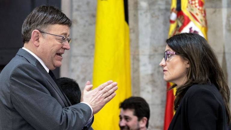 El presidente y líder de PSPV, Ximo Puig, junto a Mónica Oltra (Compromís). Foto: EFE