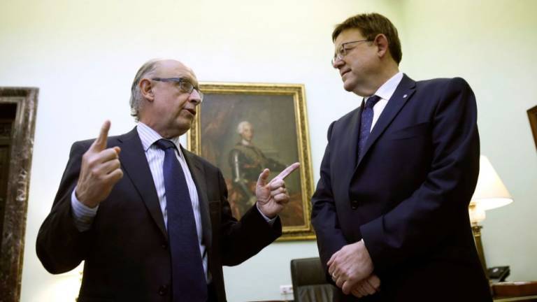 El ministro Montoro no acelera la reforma de la financiación que pide Puig. Foto: EFE