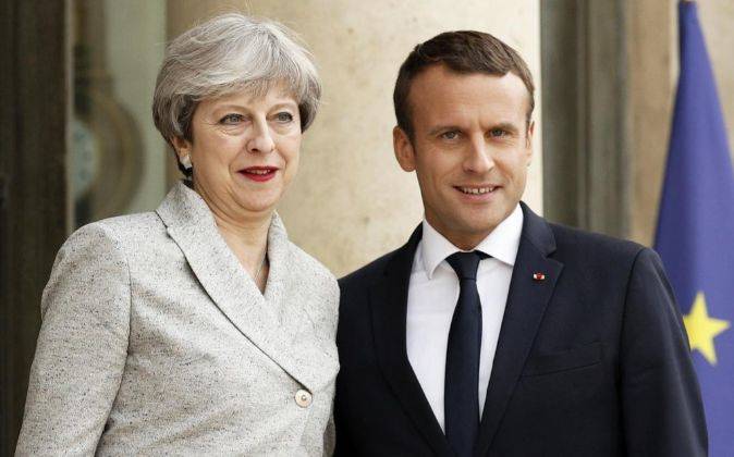 Theresa May y Emmanuel Macron. Foto: EFE