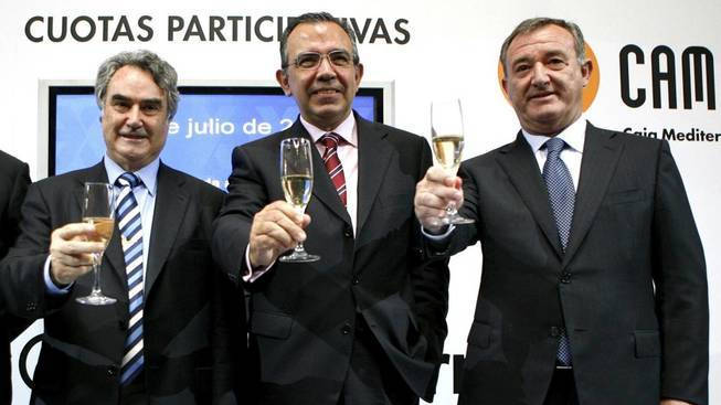 Ángel Martínez, Roberto López Abad y Juan Ramón Avilés brindan en la salida a bolsa de las cuotas