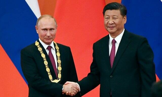 Xi Jinping con Putin.